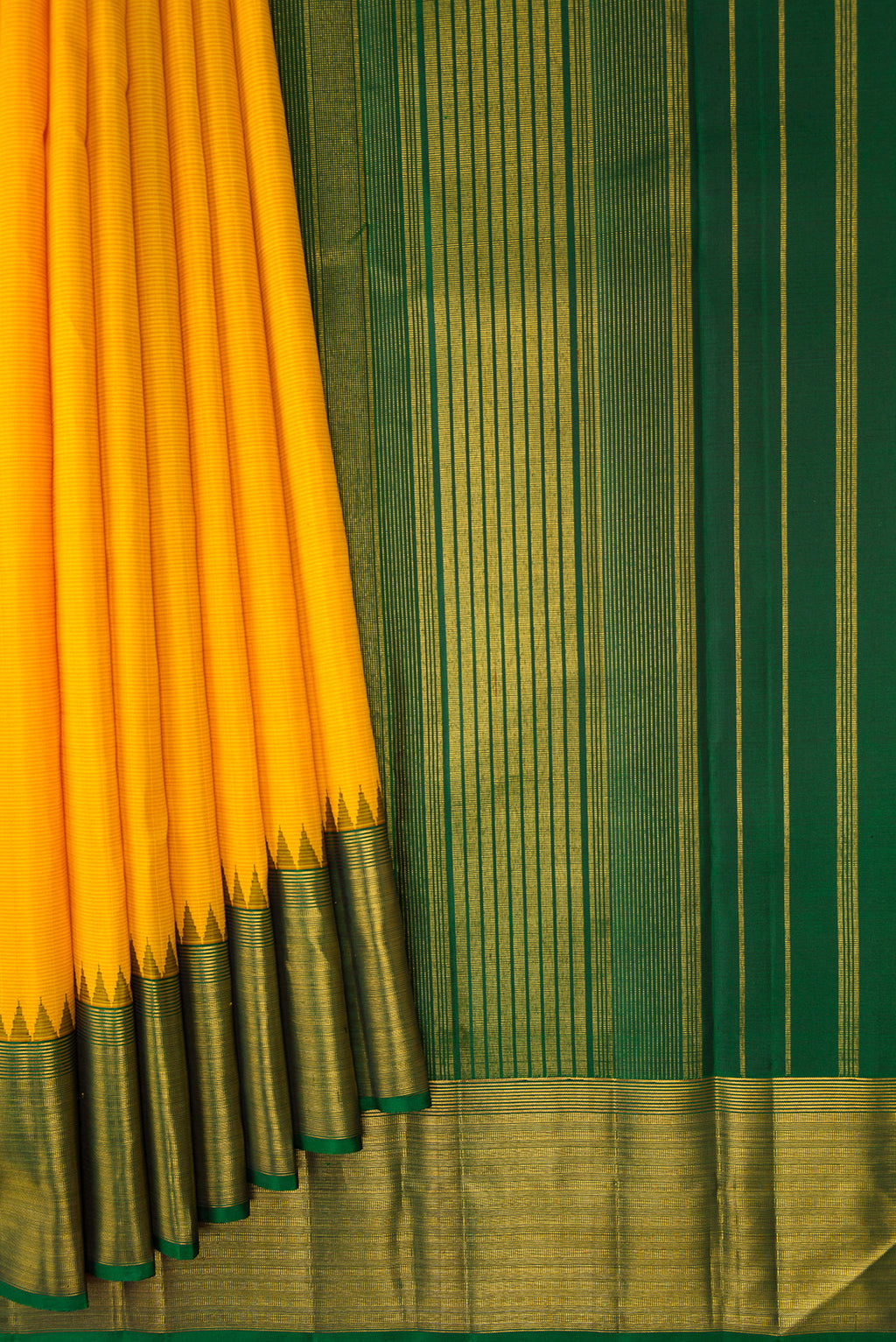 Pleats and pallu of Yellow Kanjivaram Silk Saree with Stripes on the body and Zari Border. 