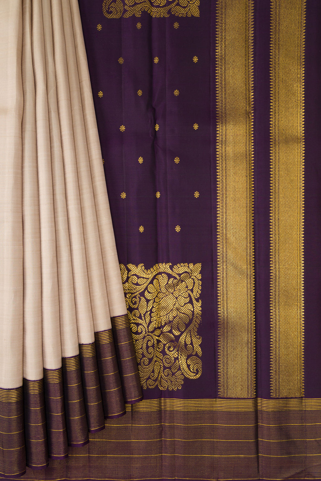 Pleats and pallu of Dark Beige Kanjivaram Silk Saree with Stripes on the body and Zari Border. 