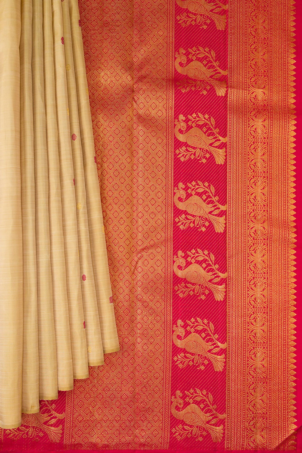 Pleats and pallu of Beige Kanjivaram Silk Saree with Zari And Thread Butta on the body and Without Border. 
