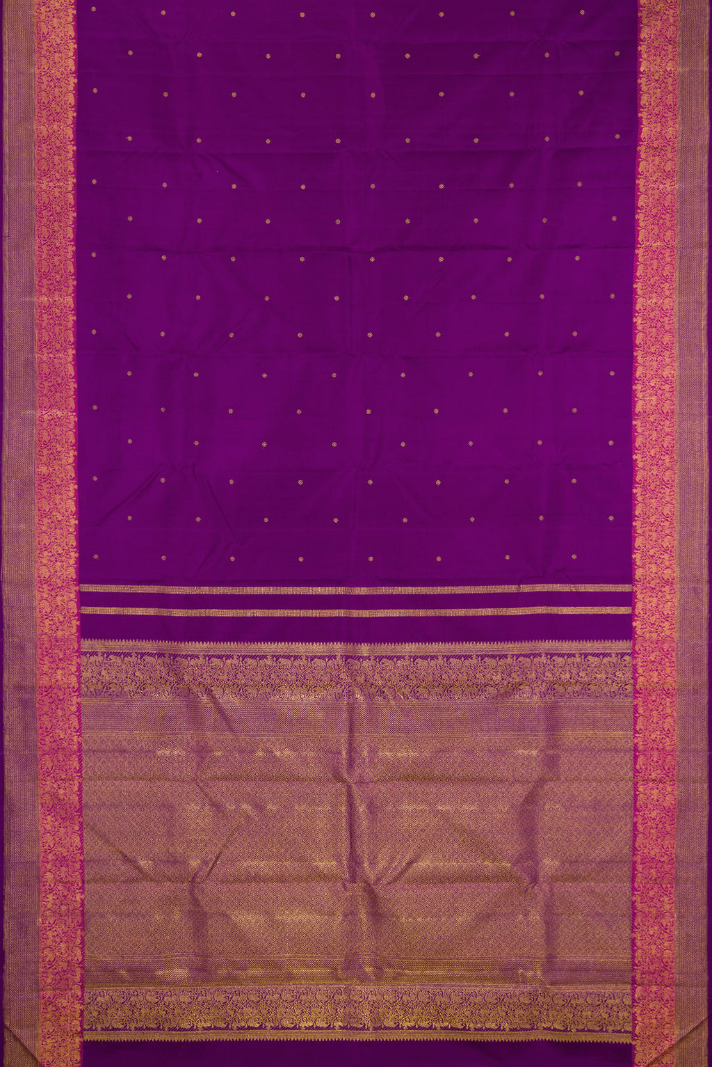 Flat view of Purple Kanjivaram Silk Saree with Zari Butta on the body and Fancy Border. 