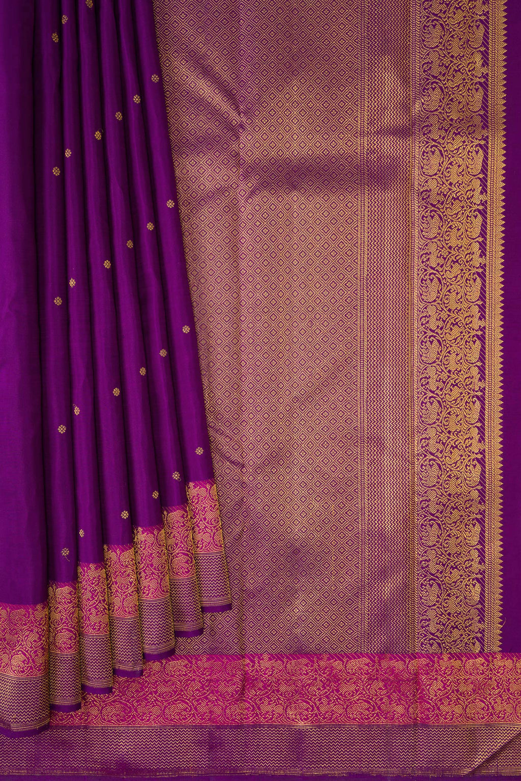 Pleats and pallu of Purple Kanjivaram Silk Saree with Zari Butta on the body and Fancy Border. 