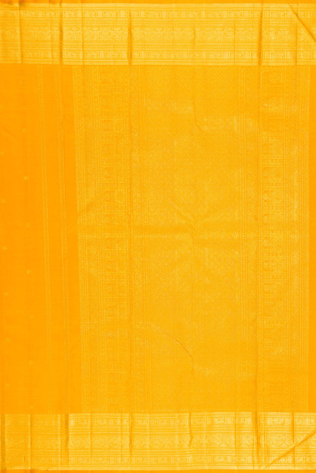 Close up image of the pallu of Yellow Kanjivaram Silk Saree with Zari Butta on the body and Zari Border. 