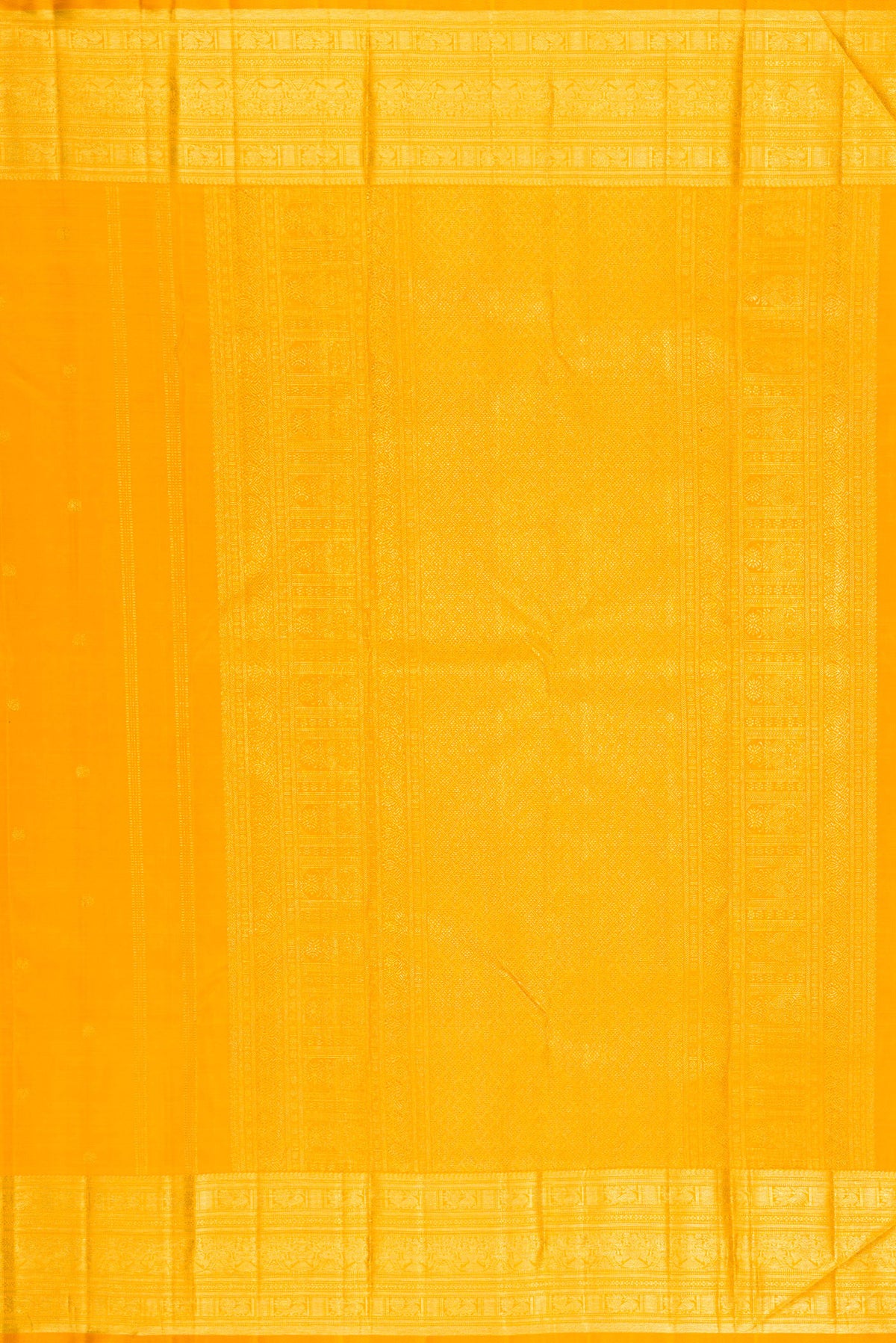 Close up image of the pallu of Yellow Kanjivaram Silk Saree with Zari Butta on the body and Zari Border. 