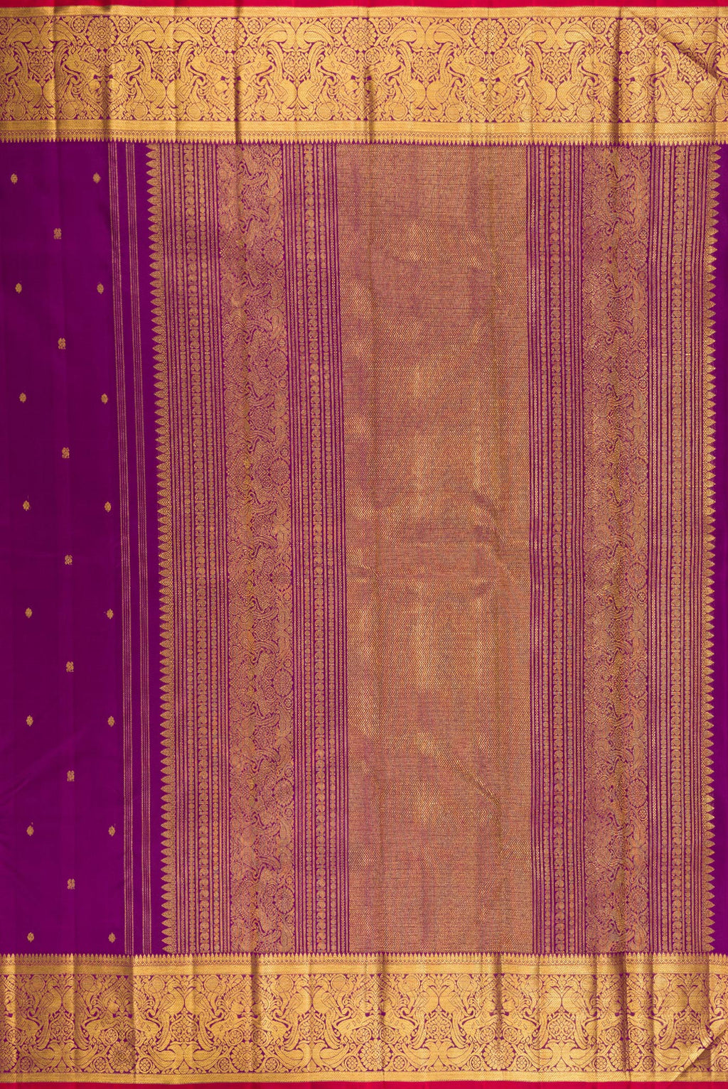 Close up image of the pallu of Purple Kanjivaram Silk Saree with Zari Butta on the body and Zari Border. 