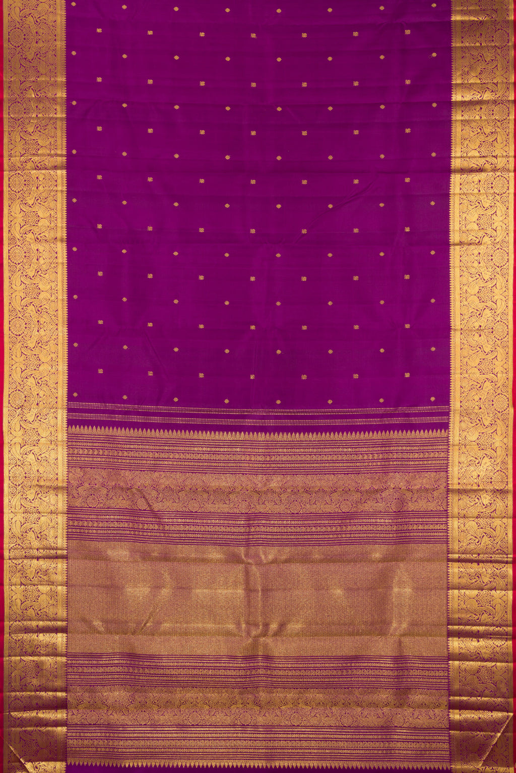 Flat view of Purple Kanjivaram Silk Saree with Zari Butta on the body and Zari Border. 