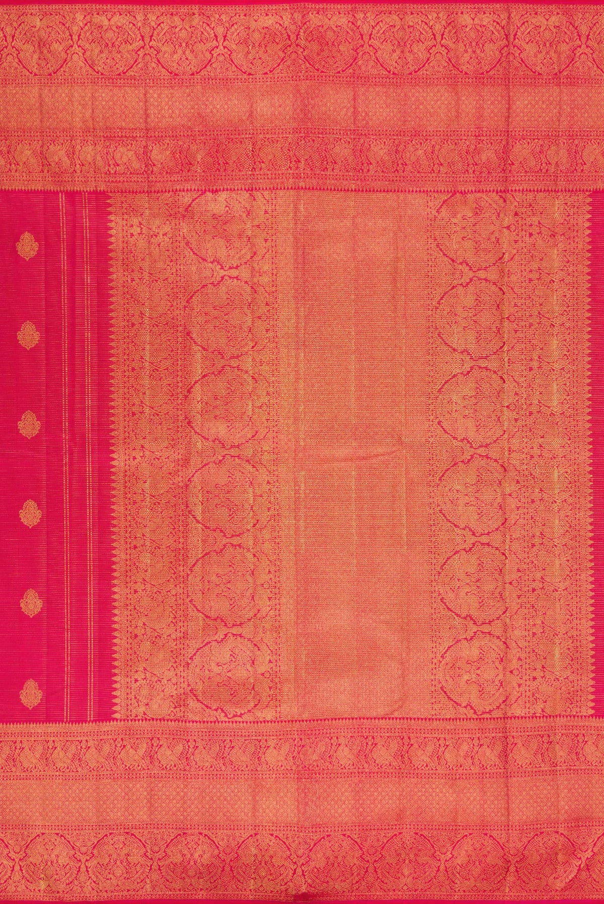 Close up image of the pallu of Pure Silk Dark Pink Kanchipuram Saree with Stripes on the body and Fancy Border. 