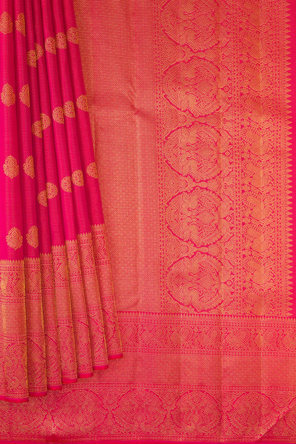 Pleats and pallu of Pure Silk Dark Pink Kanchipuram Saree with Stripes on the body and Fancy Border. 