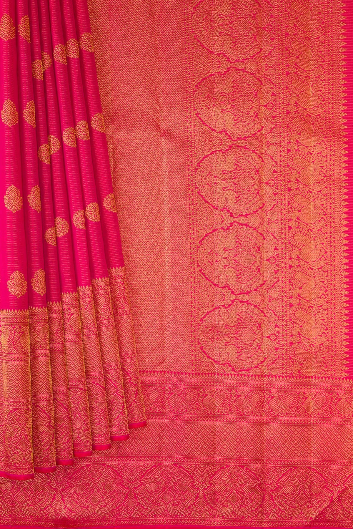 Pleats and pallu of Pure Silk Dark Pink Kanchipuram Saree with Stripes on the body and Fancy Border. 