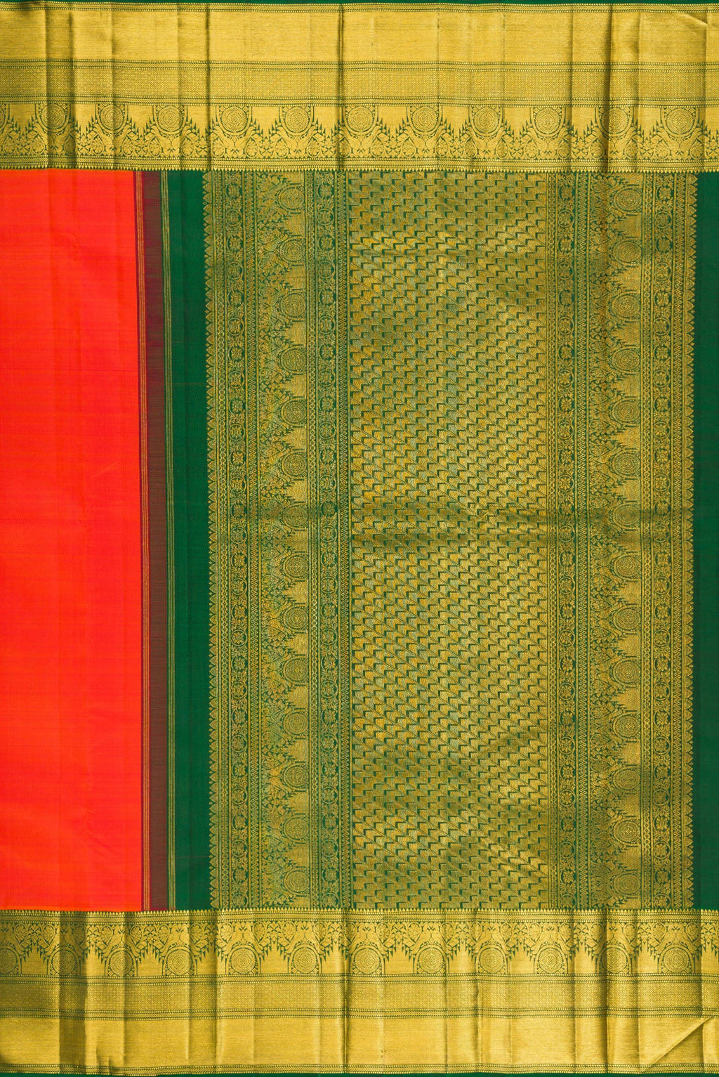 Close up image of the pallu of Orange Kanchipuram Silk Saree with Plain Body and Fancy Border. 