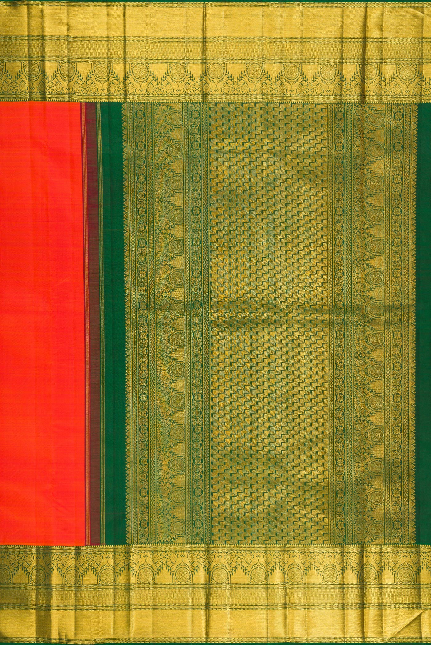 Close up image of the pallu of Orange Kanchipuram Silk Saree with Plain Body and Fancy Border. 