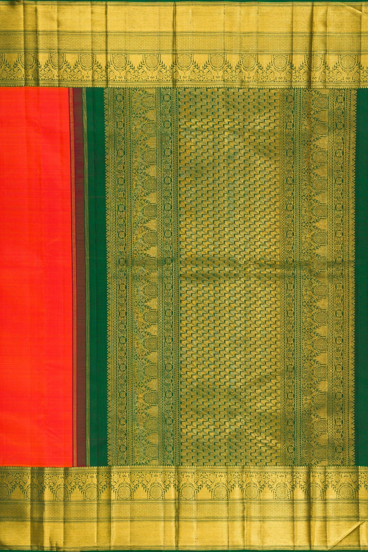 Close up image of the pallu of Orange Kanchipuram Silk Saree with Plain Body and Fancy Border. 