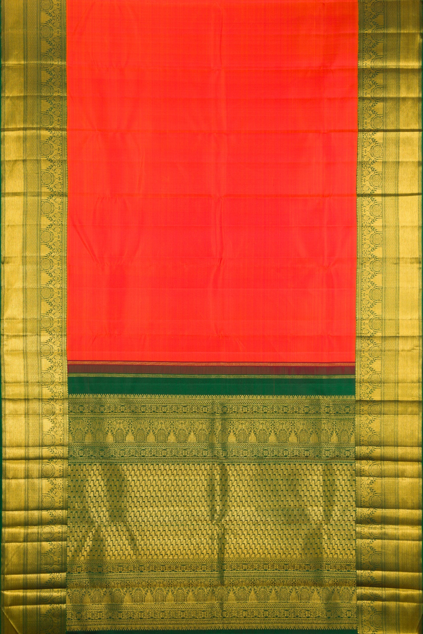 Flat view of Orange Kanchipuram Silk Saree with Plain Body and Fancy Border. 