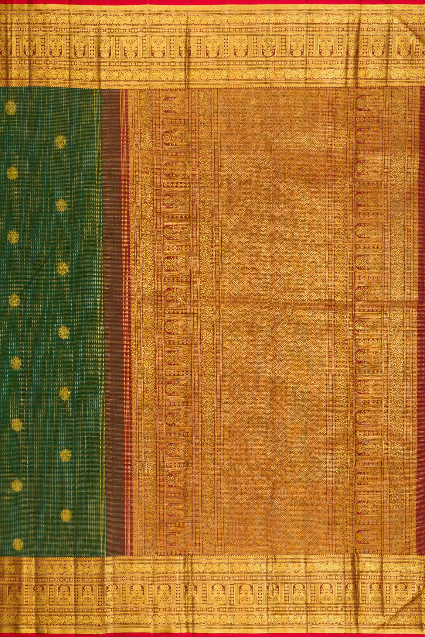 Close up image of the pallu of Bottle Green Kanchipuram Silk Saree with Checked design on the body and Fancy Border. 