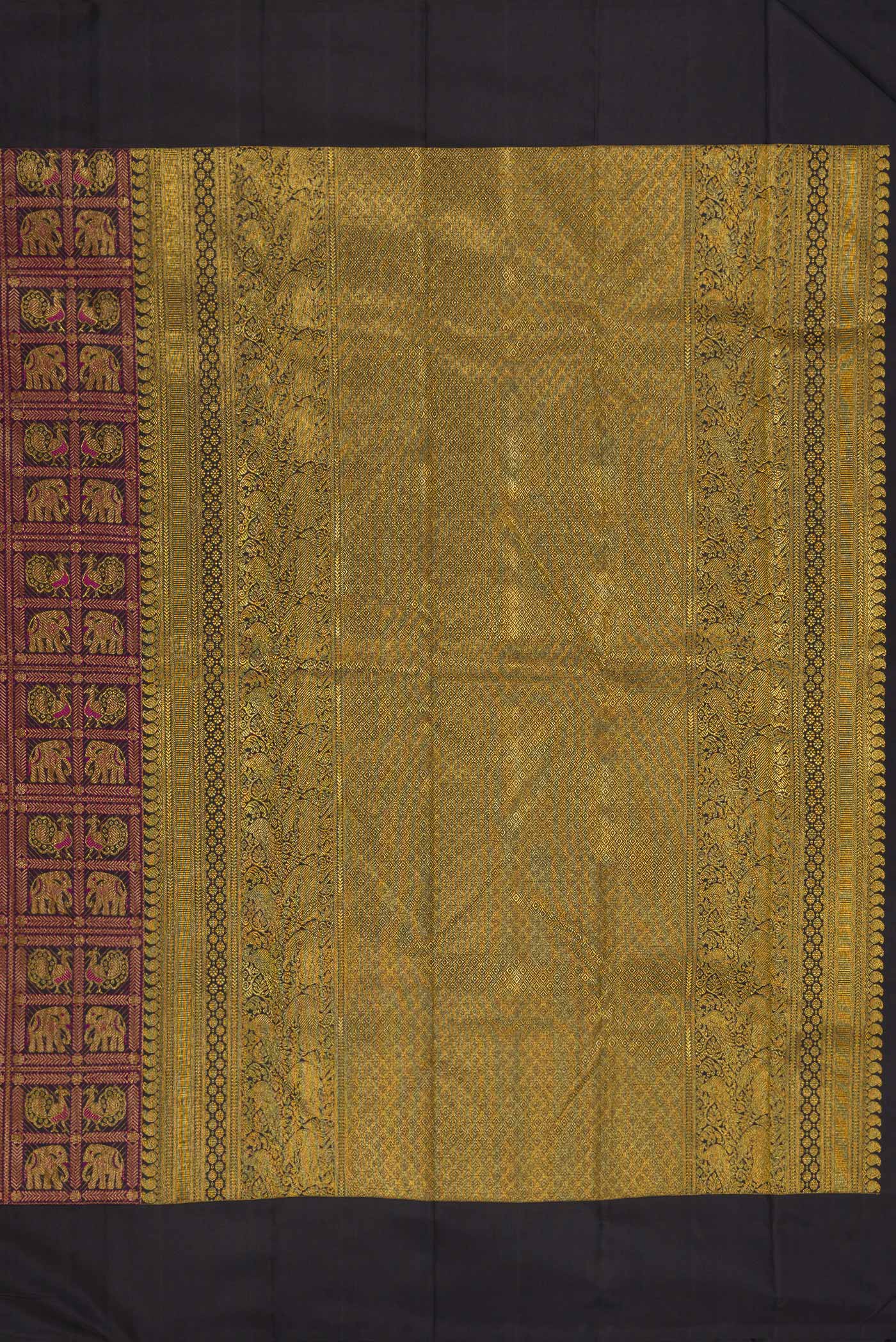 Close up image of the pallu of Pure Silk Black Kanchipuram Saree with Zari Brocade on the body and Plain Border. 