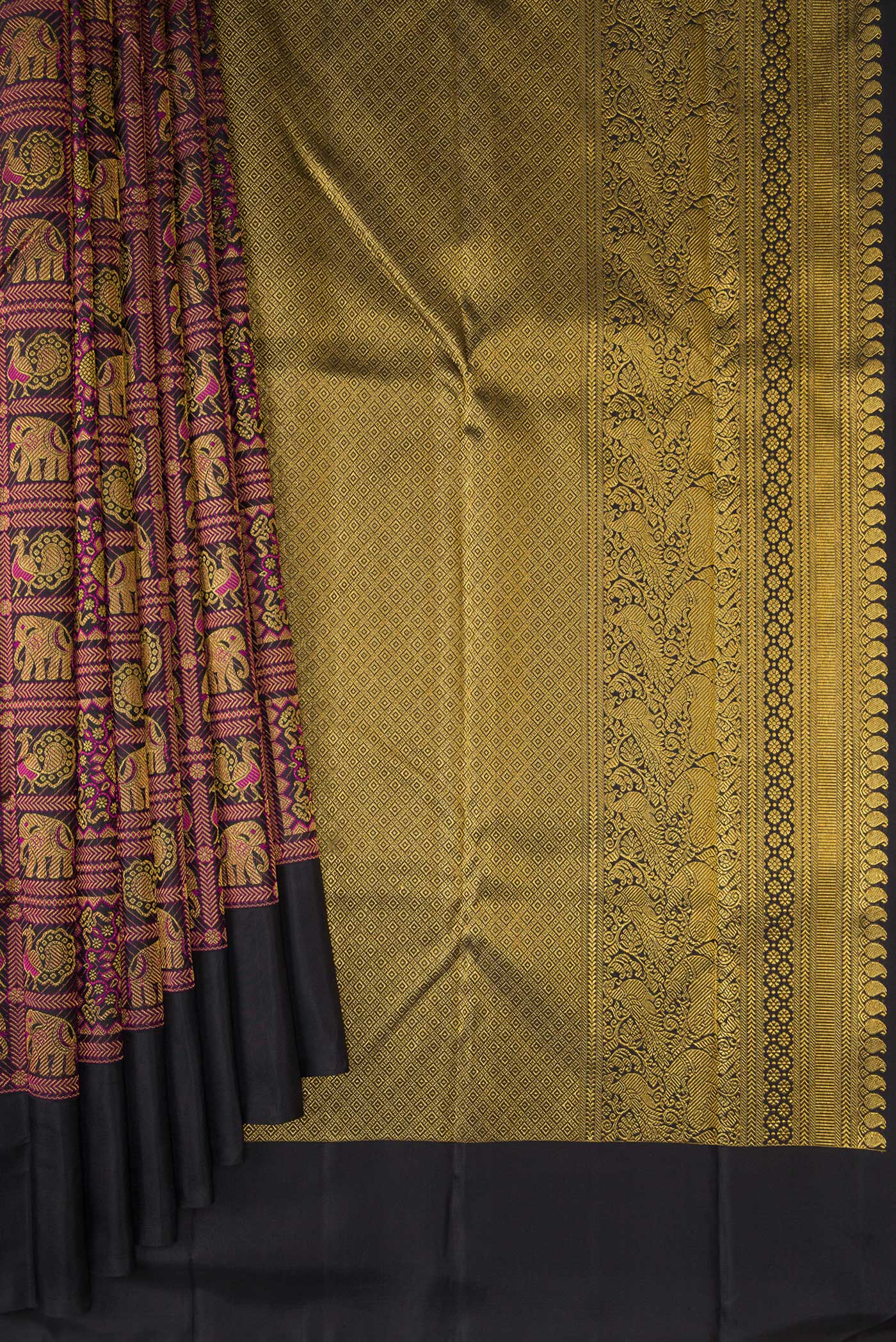 Pleats and pallu of Pure Silk Black Kanchipuram Saree with Zari Brocade on the body and Plain Border. 