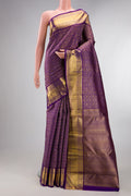 Pure Silk Violet Kanchipuram Saree with Zari Brocade on the body and Zari Border.  displayed on a mannequin