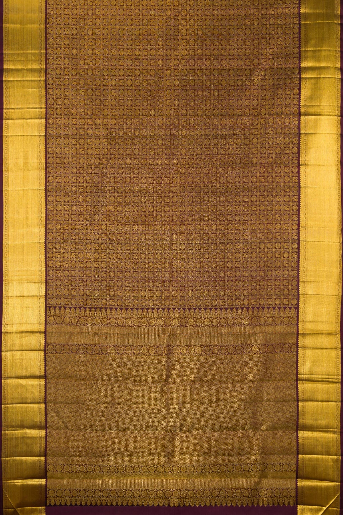 Flat view of Pure Silk Coffee Brown Kanchipuram Saree with Zari Brocade on the body and Zari Border. 