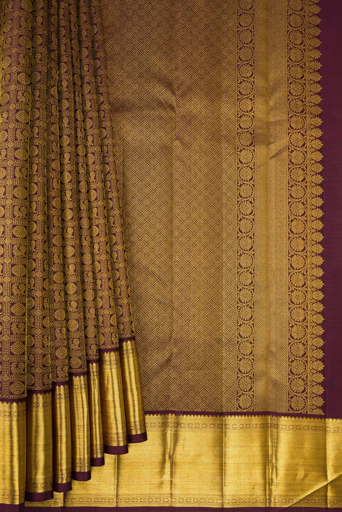 Pleats and pallu of Pure Silk Coffee Brown Kanchipuram Saree with Zari Brocade on the body and Zari Border. 