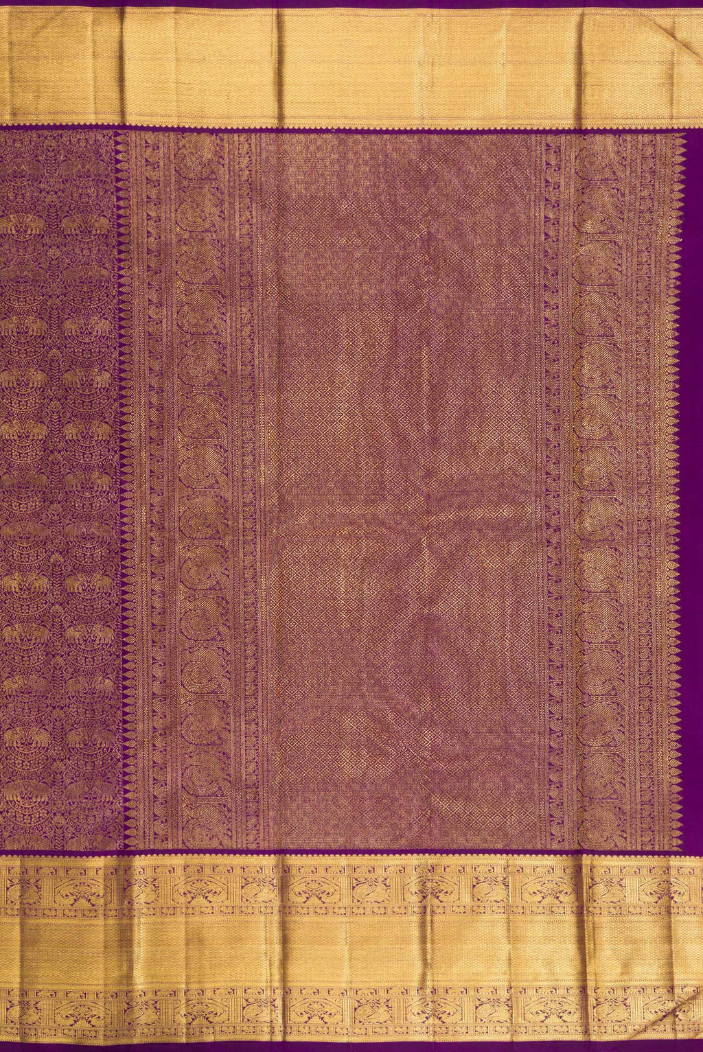 Close up image of the pallu of Pure Silk Purple Kanchipuram Saree with Zari Brocade on the body and Zari Border. 