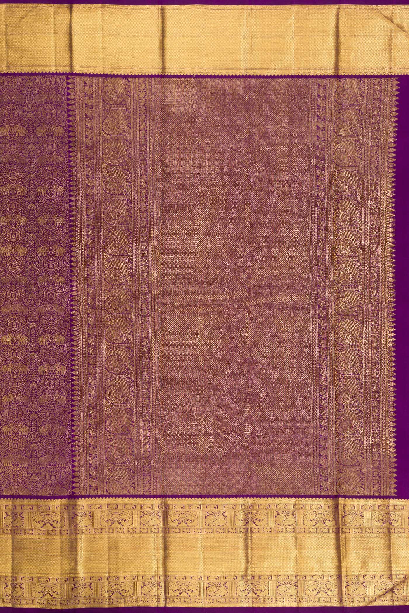 Close up image of the pallu of Pure Silk Purple Kanchipuram Saree with Zari Brocade on the body and Zari Border. 
