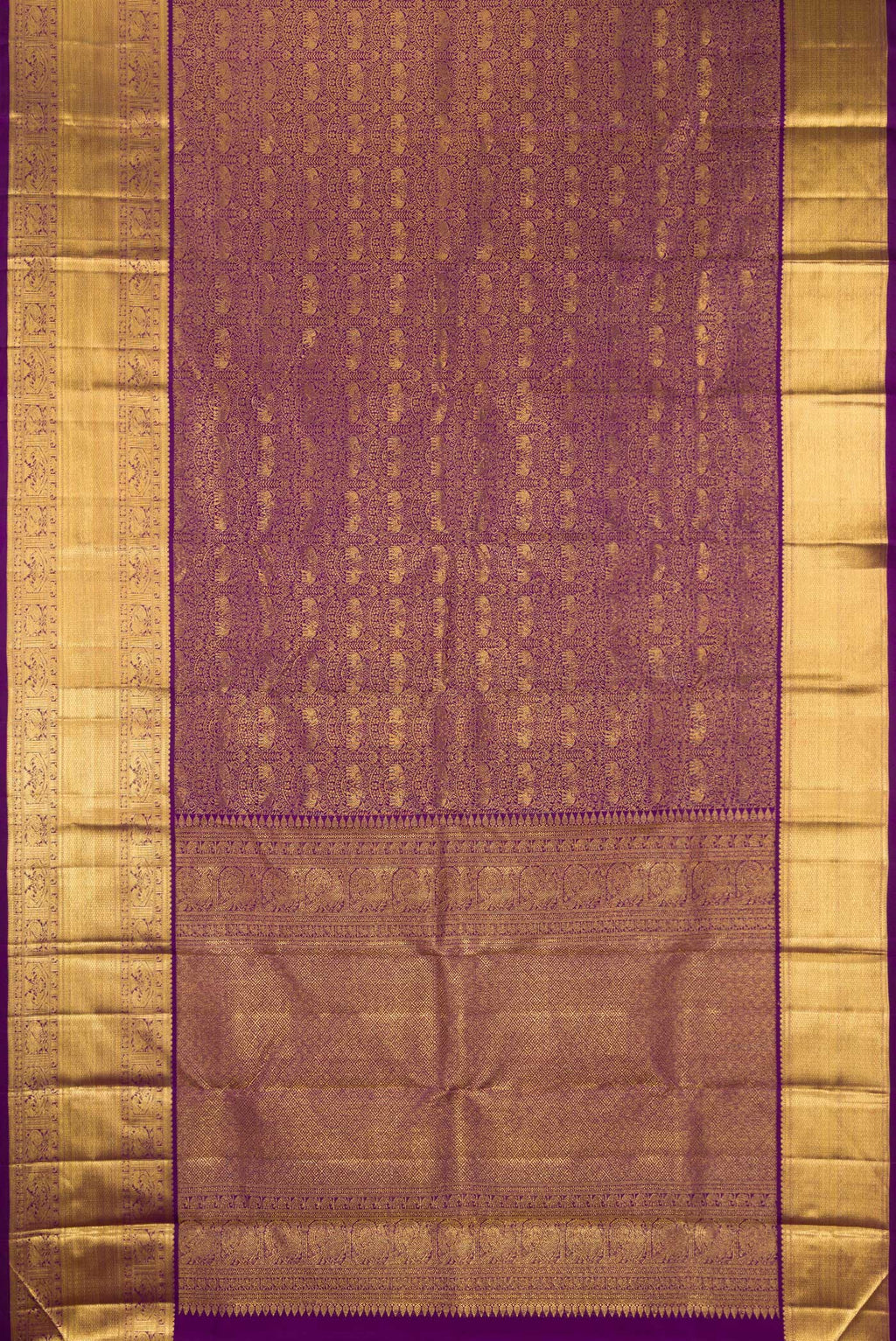 Flat view of Pure Silk Purple Kanchipuram Saree with Zari Brocade on the body and Zari Border. 