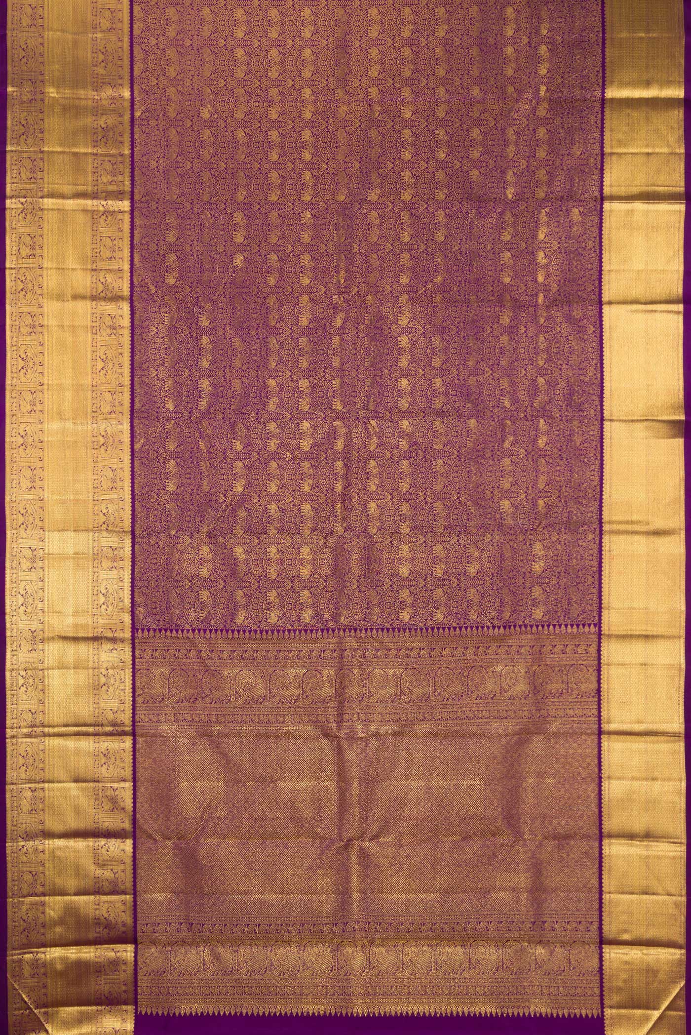 Flat view of Pure Silk Purple Kanchipuram Saree with Zari Brocade on the body and Zari Border. 
