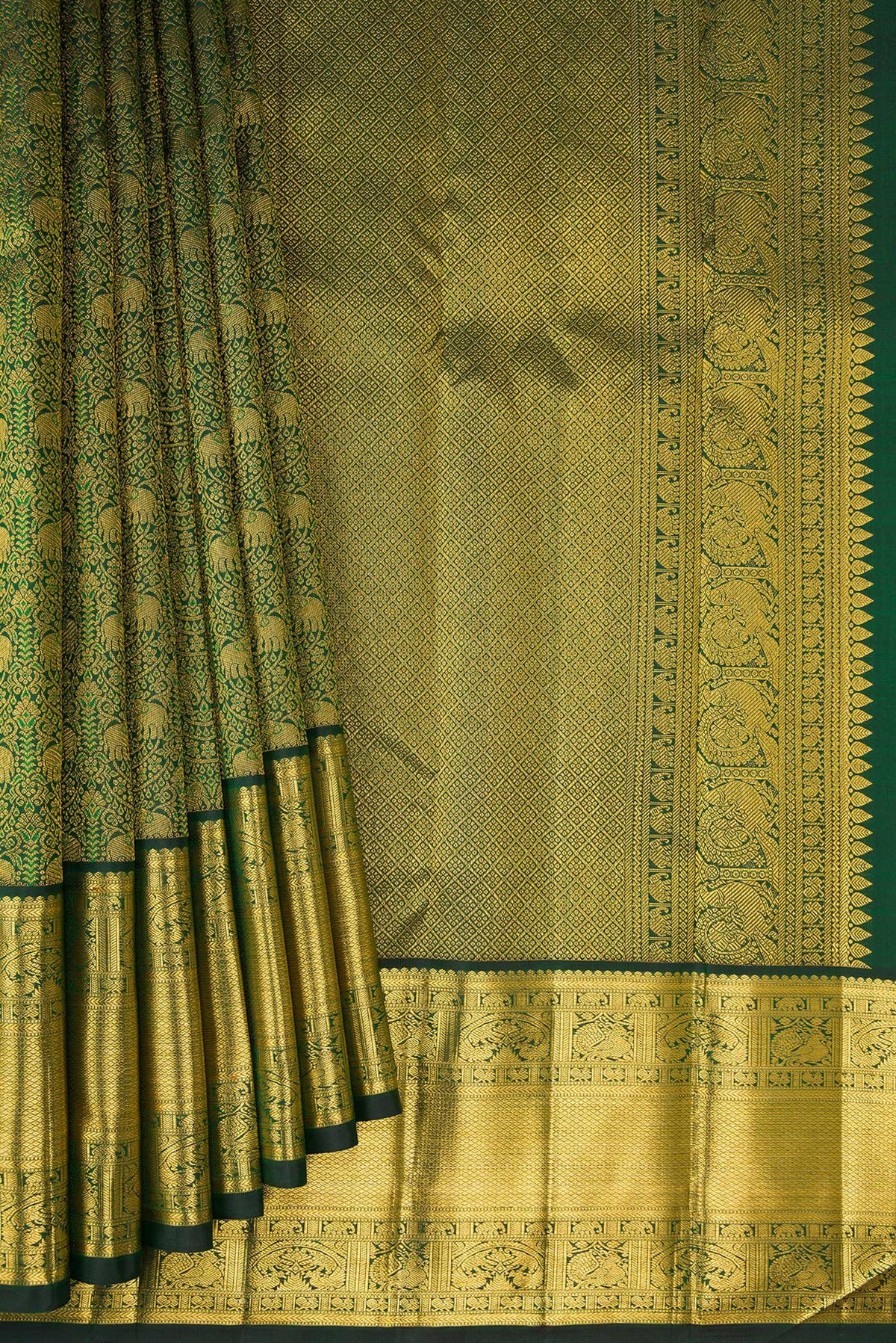 Pleats and pallu of Pure Silk Bottle Green Kanchipuram Saree with Zari Brocade on the body and Zari Border. 