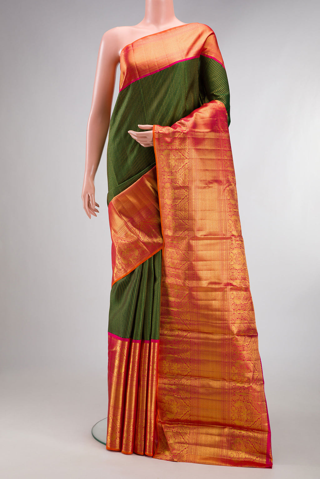 Pure Silk Bottle Green Kanchipuram Saree with Stripes on the body and Zari Border.  displayed on a mannequin