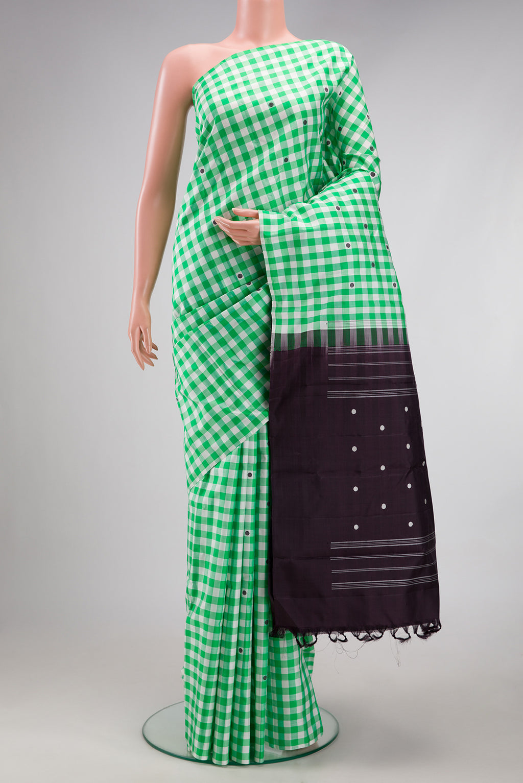 Multi Color Kanjivaram Silk Saree with Checked design on the body and Without Border.  displayed on a mannequin