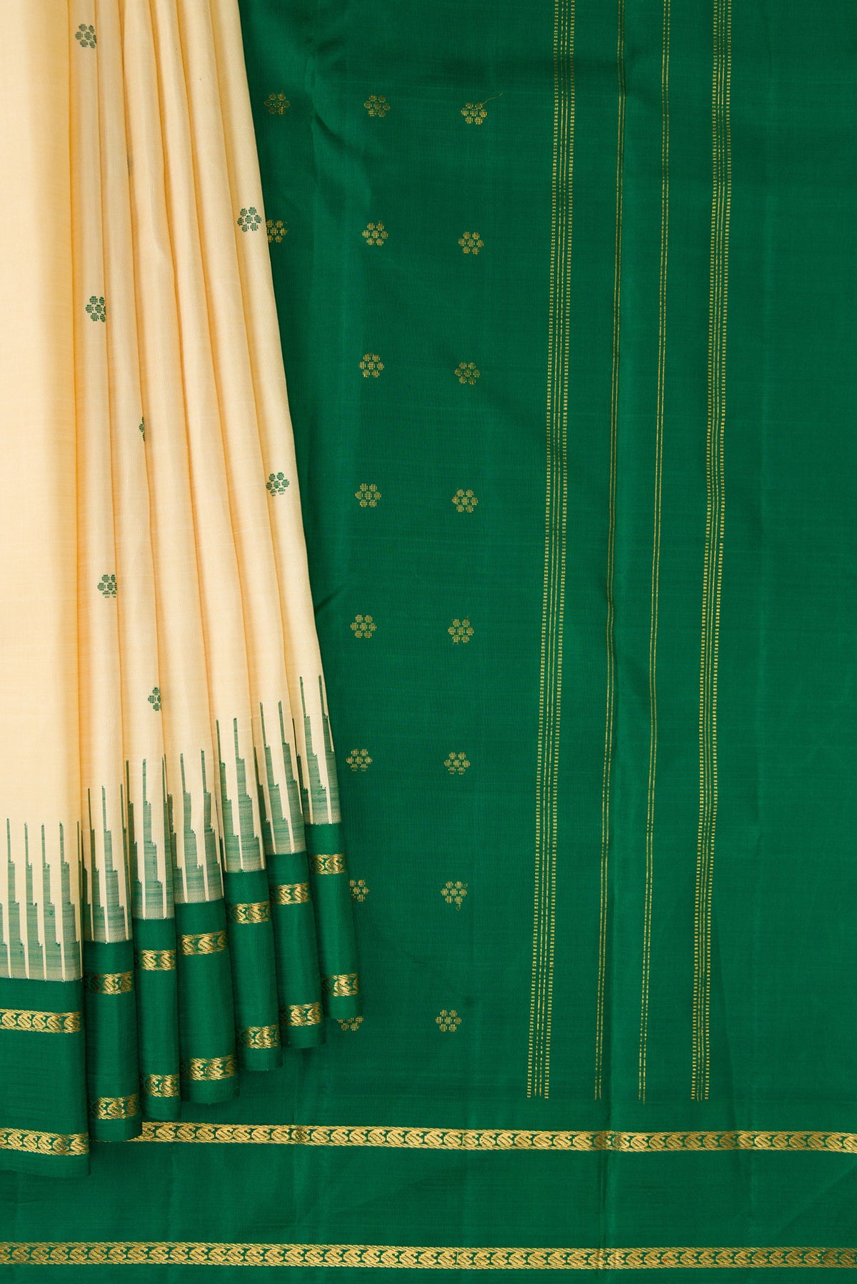 Pleats and pallu of Pure Silk Pure Zari Sandal Dual Tone Kanjivaram Saree with Thread Butta on the body and Zari Border. 