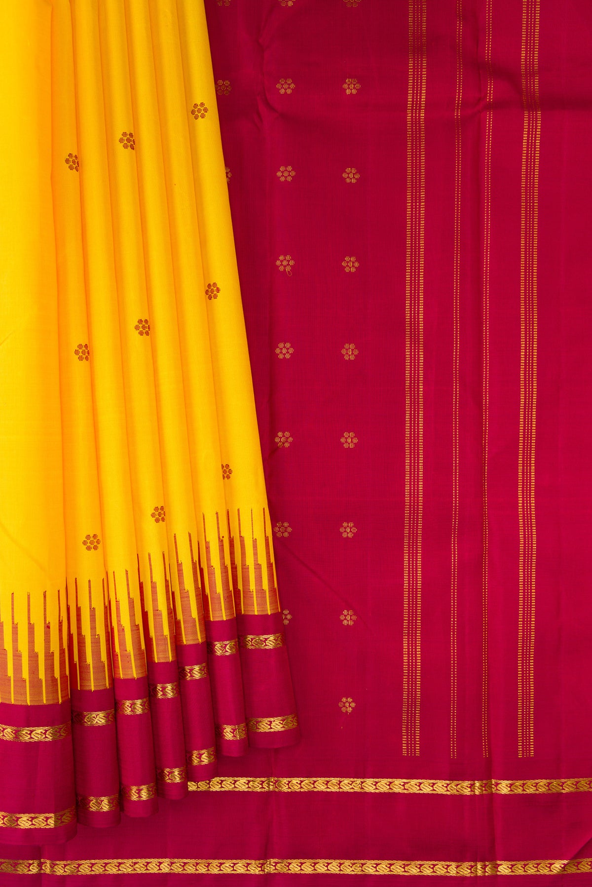 Pleats and pallu of Pure Silk Pure Zari Yellow Kanjivaram Saree with Thread Butta on the body and One Side Border. 