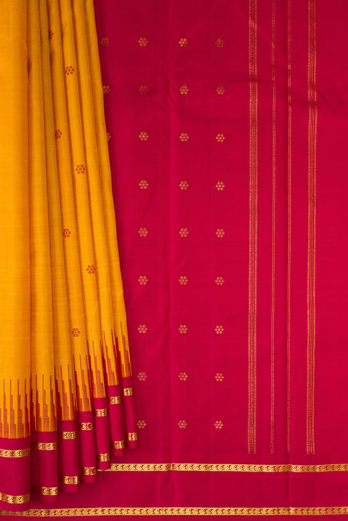 Pleats and pallu of Pure Silk Pure Zari Mustard Kanjivaram Saree with Thread Butta on the body and One Side Border. 