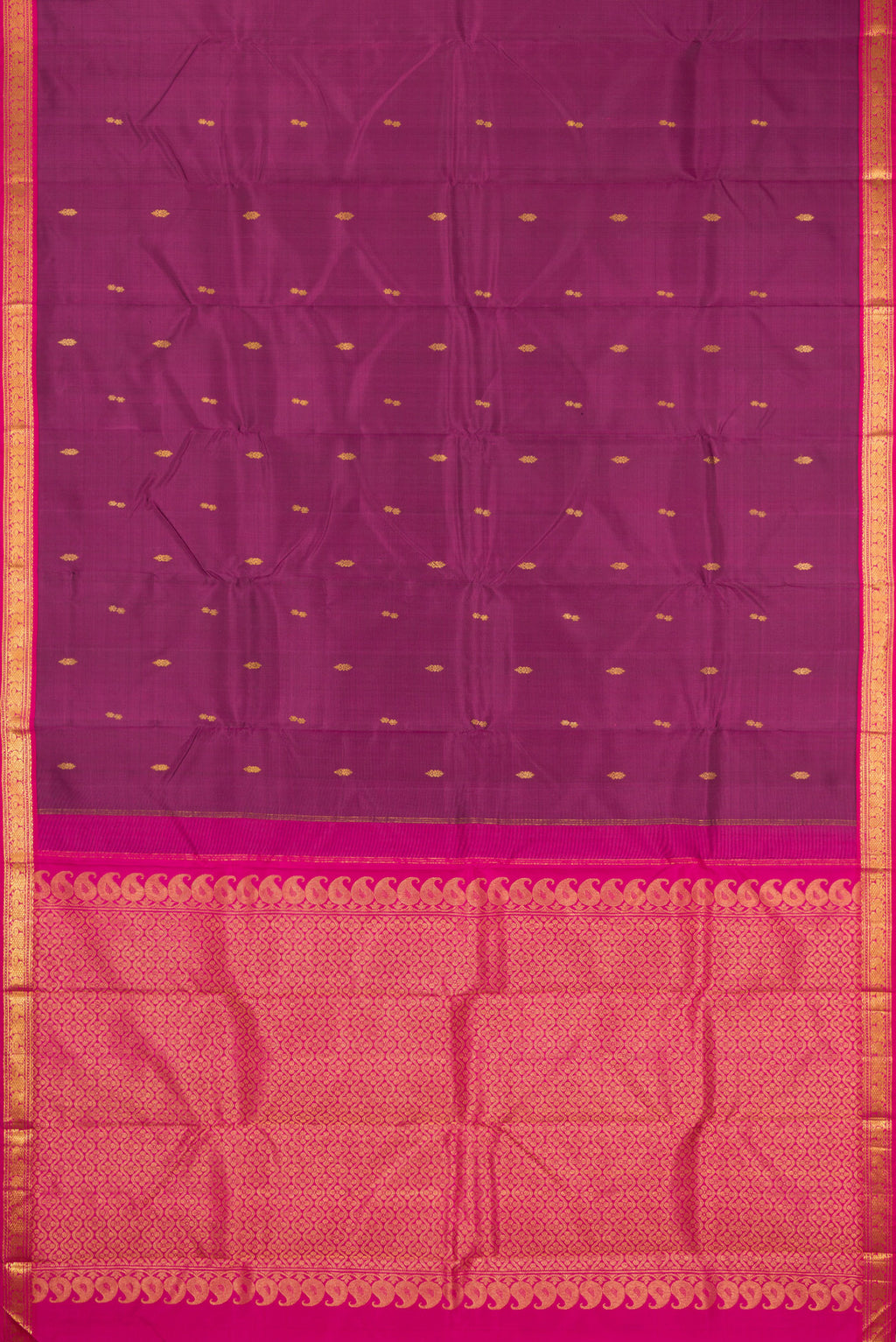 Flat view of Magenta Kanchipuram Silk Saree with Zari Butta on the body and Zari Border. 