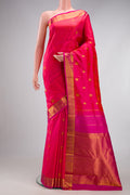 Pink Dual Tone Kanchipuram Silk Saree with Zari Butta on the body and Zari Border.  displayed on a mannequin