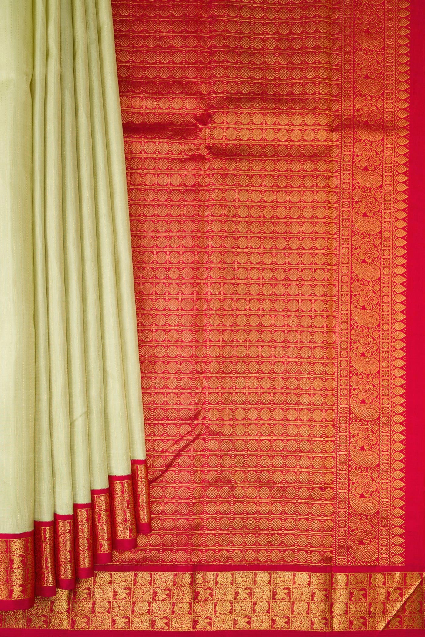 Pleats and pallu of Pista Green Kanjivaram Silk Saree with Stripes on the body and Zari Border. 