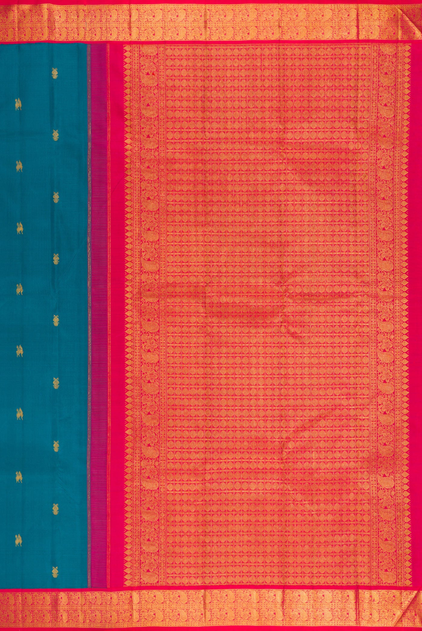 Close up image of the pallu of Blue Kanjivaram Silk Saree with Zari Butta on the body and Zari Border. 
