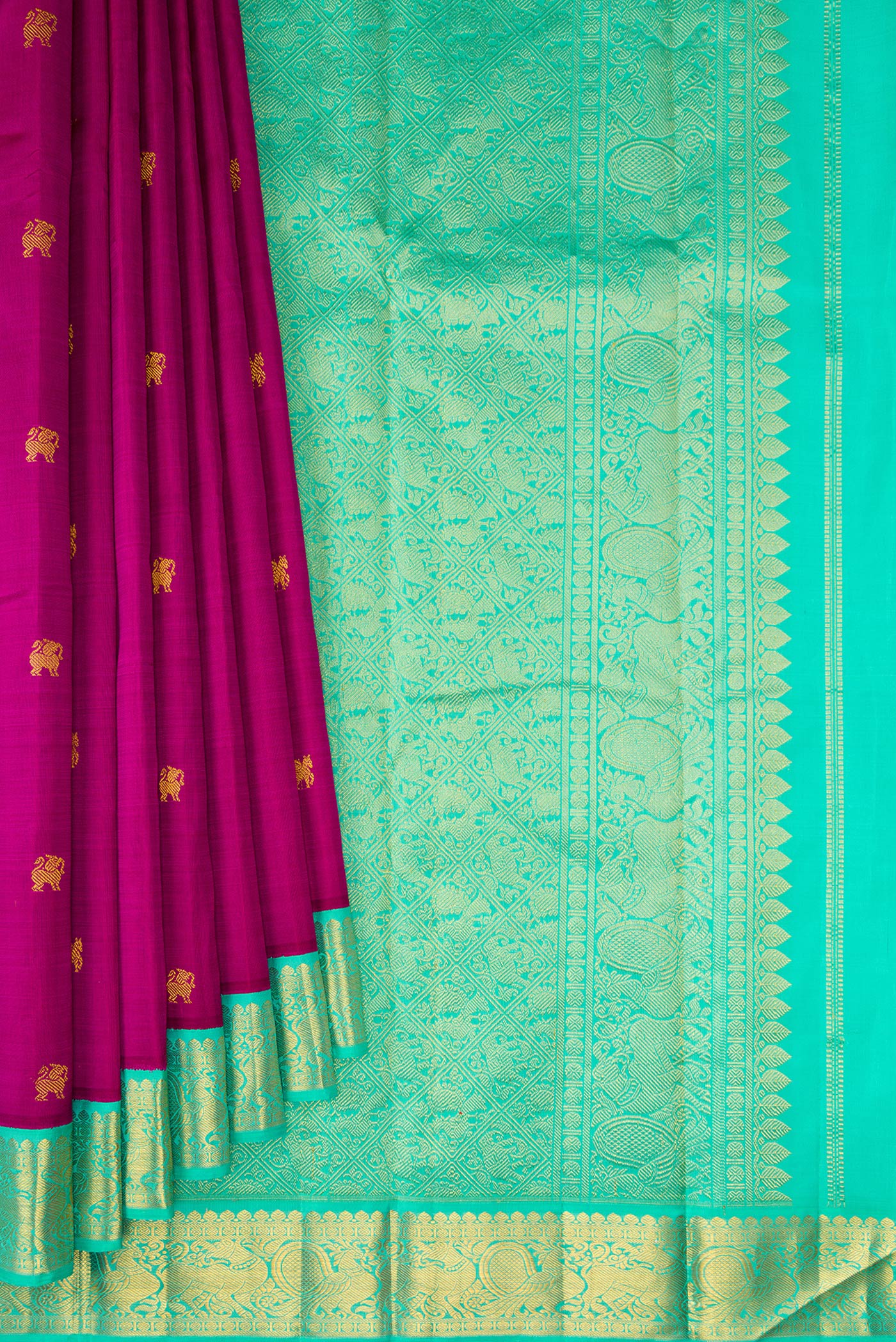 Pleats and pallu of Magenta Kanjivaram Silk Saree with Zari Butta on the body and Zari Border. 