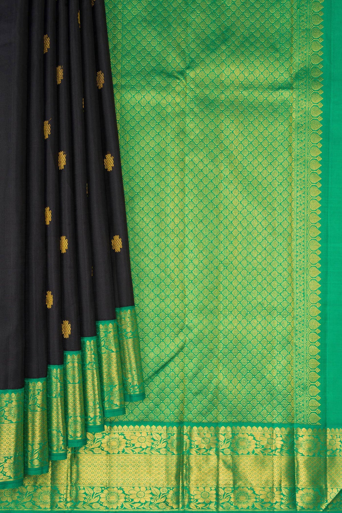 Pleats and pallu of Black Kanjivaram Silk Saree with Zari Butta on the body and Fancy Border. 