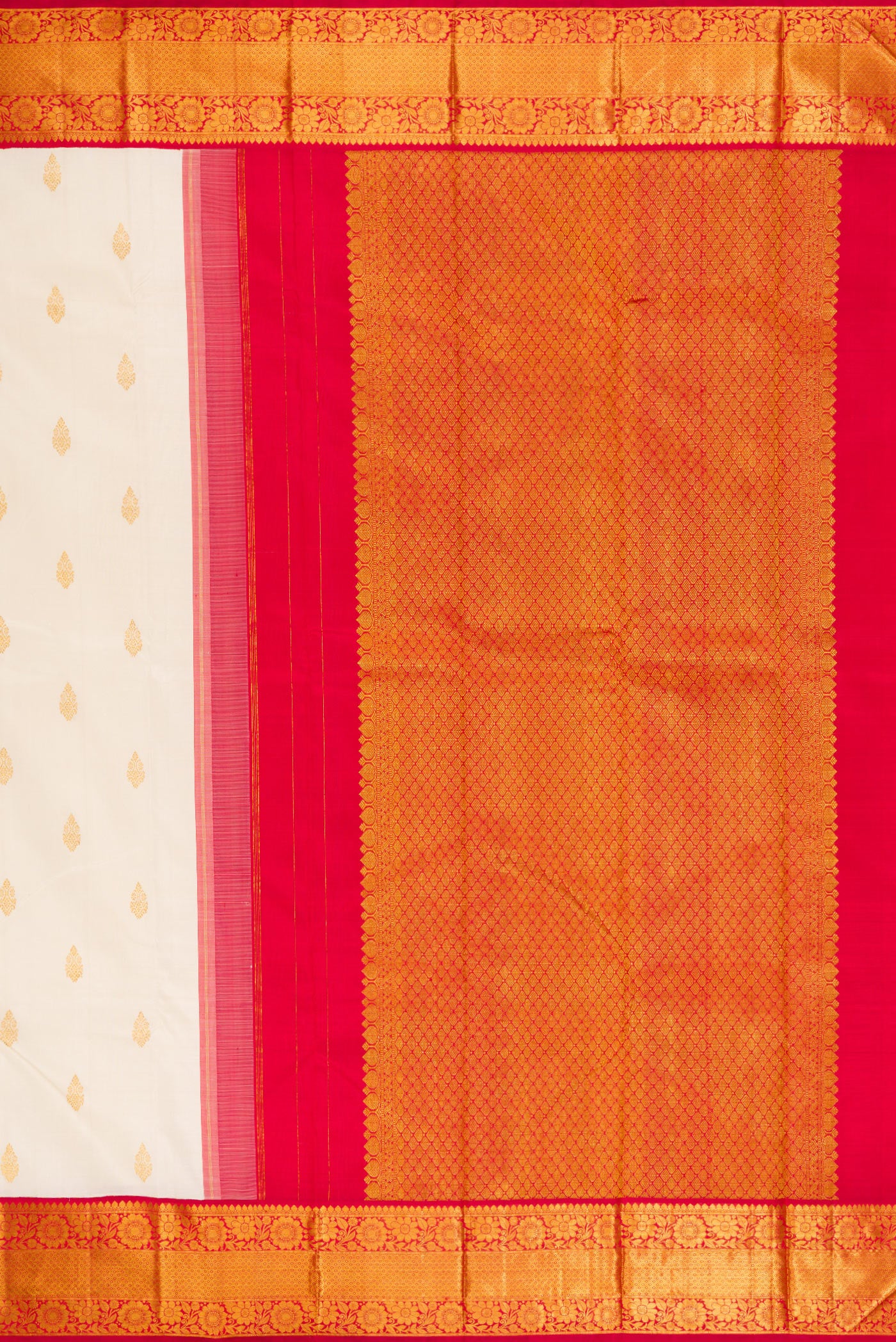 Close up image of the pallu of Off White Kanjivaram Silk Saree with Zari Butta on the body and Zari Border. 