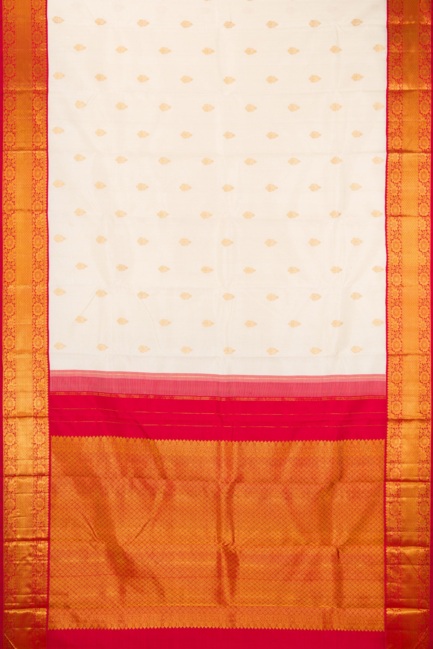 Flat view of Off White Kanjivaram Silk Saree with Zari Butta on the body and Zari Border. 