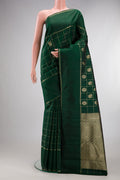 Pure Silk Bottle Green Kanchipuram Saree with Checked design on the body and Plain Border.  displayed on a mannequin
