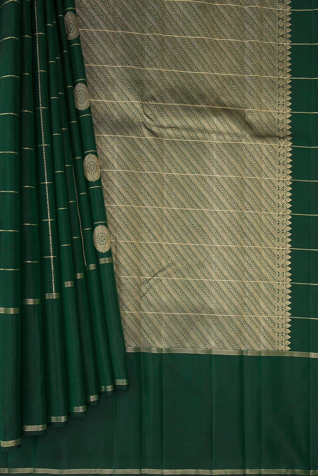Pleats and pallu of Pure Silk Bottle Green Kanchipuram Saree with Checked design on the body and Plain Border. 