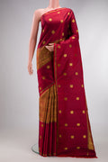 Maroon Kanjivaram Silk Saree with Zari Brocade on the body and Zari Border.  displayed on a mannequin