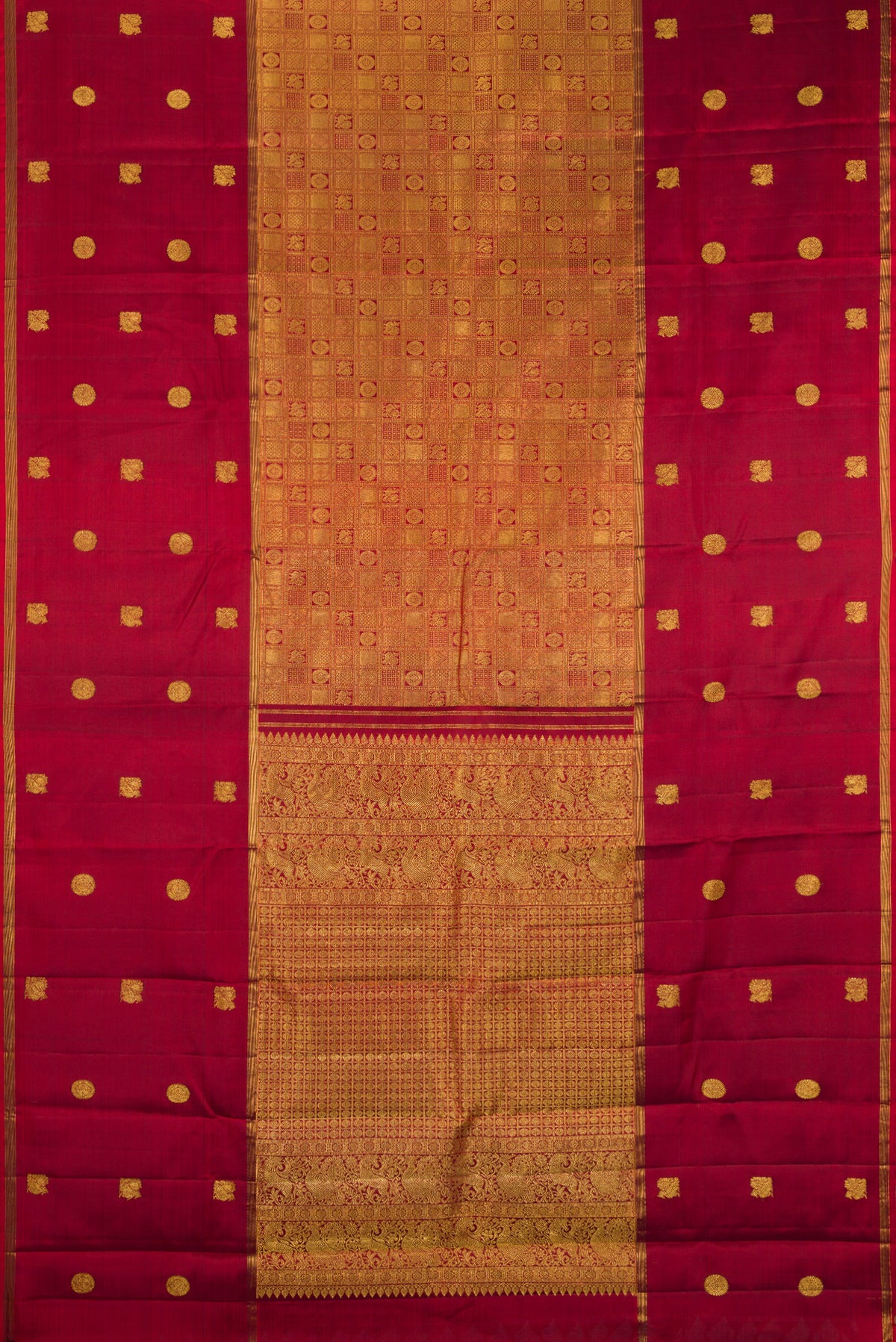 Flat view of Maroon Kanjivaram Silk Saree with Zari Brocade on the body and Zari Border. 