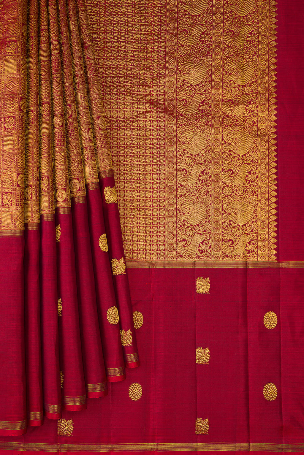 Pleats and pallu of Maroon Kanjivaram Silk Saree with Zari Brocade on the body and Zari Border. 