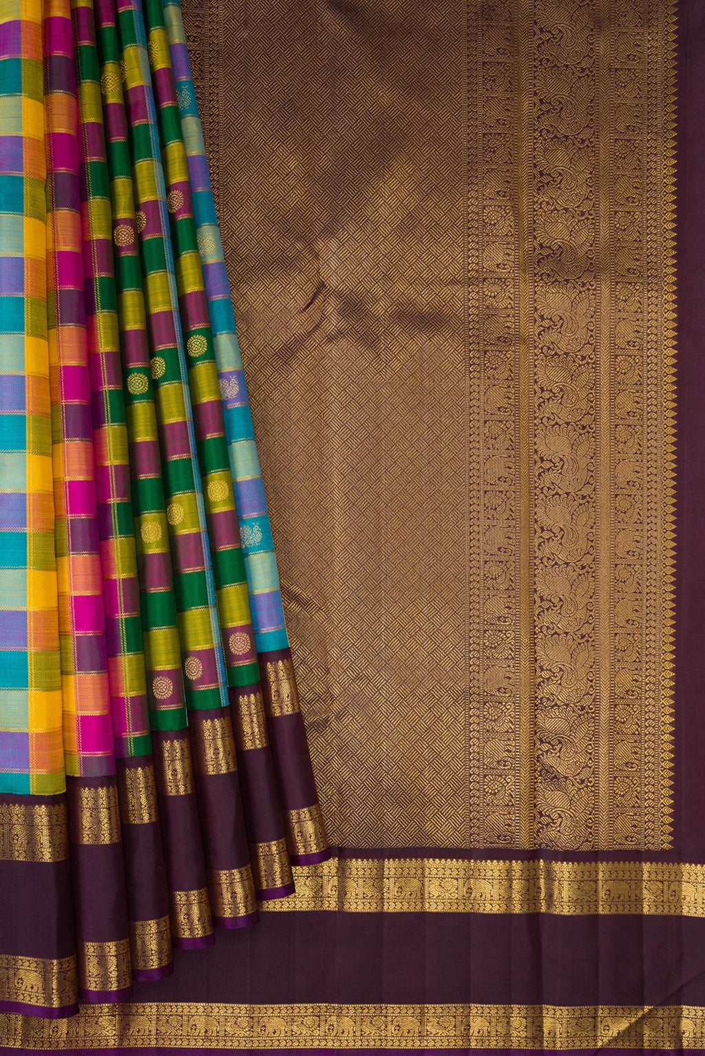 Pleats and pallu of Multi Color Kanchipuram Silk Saree with Checked design on the body and Zari Border. 