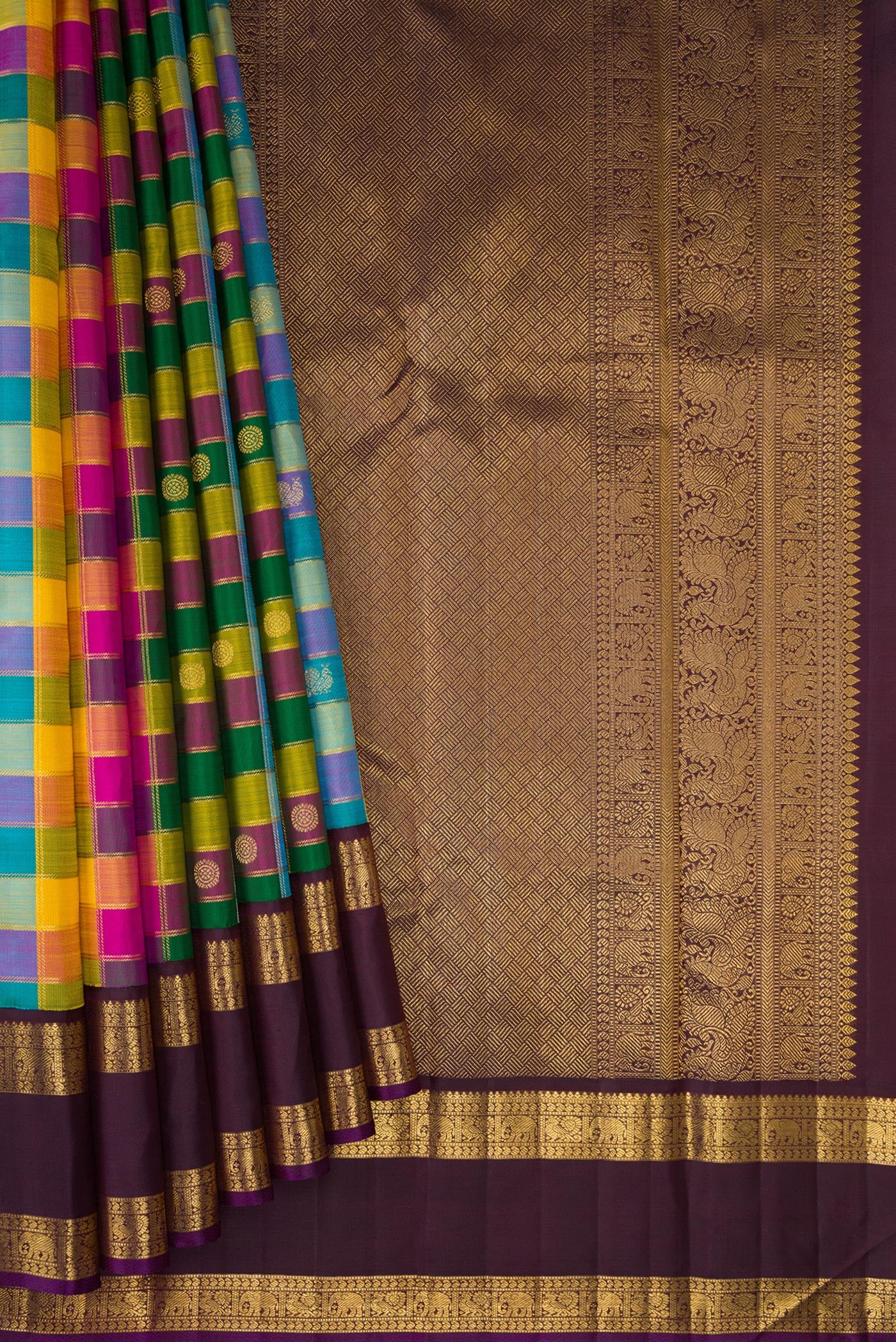 Pleats and pallu of Multi Color Kanchipuram Silk Saree with Checked design on the body and Zari Border. 