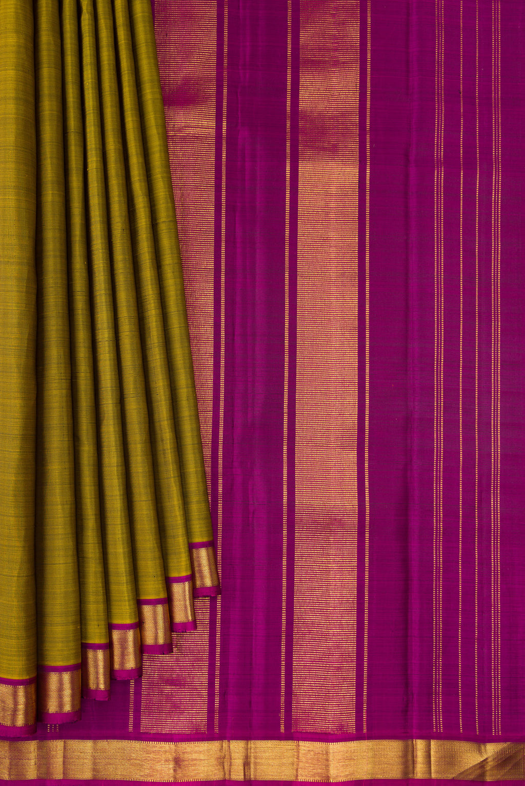Pleats and pallu of Mehandi Green Kanjivaram Silk Saree with Plain Body and Zari Border. 
