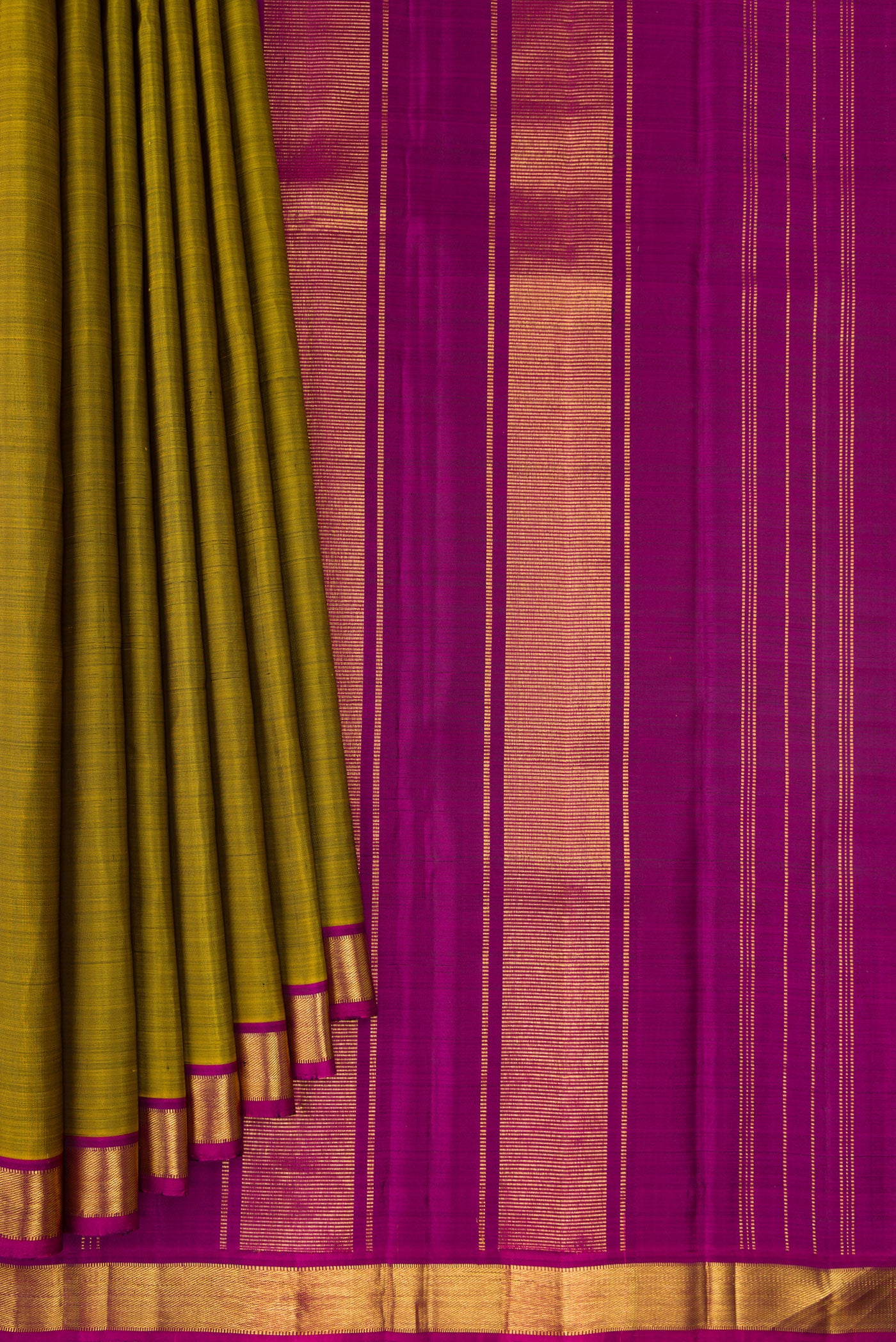 Pleats and pallu of Mehandi Green Kanjivaram Silk Saree with Plain Body and Zari Border. 