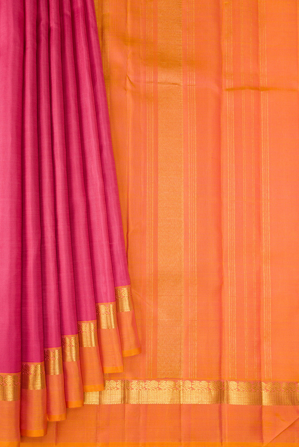 Pleats and pallu of Rose pink Kanjivaram Silk Saree with Plain Body and Zari Border. 